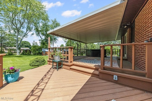 1033 Briarcliff Ave, Alliance, OH 44601 - deck featuring a lawn