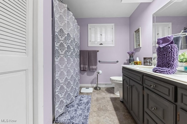 1033 Briarcliff Ave, Alliance, OH 44601 - bathroom featuring toilet, vanity, baseboards, a shower with curtain, and tile patterned flooring