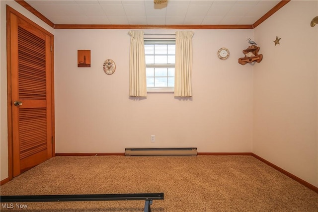 58429 Lashley Rd, Senecaville, OH 43780 - spare room featuring crown molding, a baseboard radiator, carpet, and baseboards
