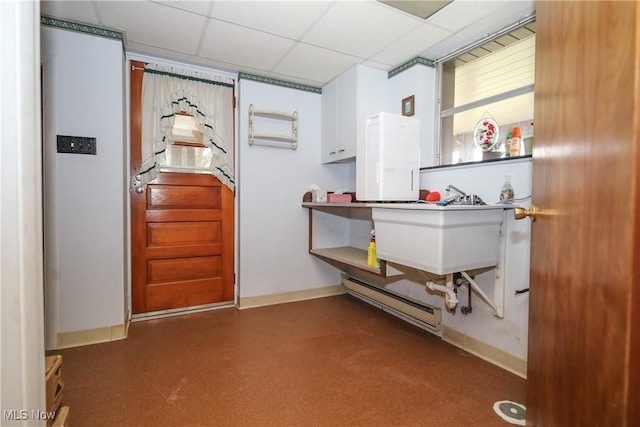 58429 Lashley Rd, Senecaville, OH 43780 - foyer featuring a baseboard radiator, baseboards, and a paneled ceiling
