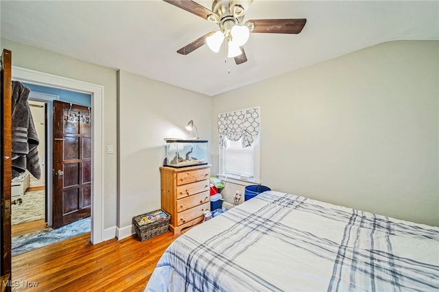 3906 Redfern Rd, Parma, OH 44134 - bedroom with wood finished floors, ceiling fan, and baseboards