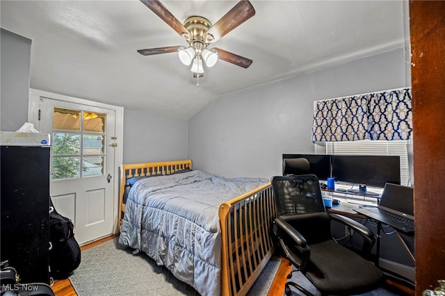 3906 Redfern Rd, Parma, OH 44134 - bedroom featuring vaulted ceiling, wood finished floors, an office area, and ceiling fan
