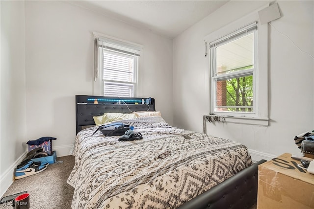 11020 Woodstock Ave, Cleveland, OH 44104 - carpeted bedroom with multiple windows and baseboards