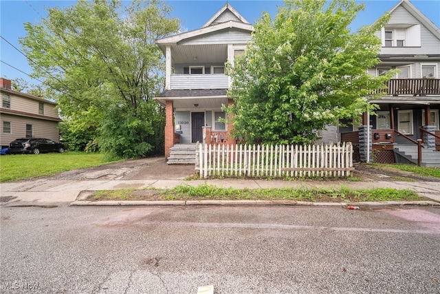 11020 Woodstock Ave, Cleveland, OH 44104 - view of front facade with a balcony