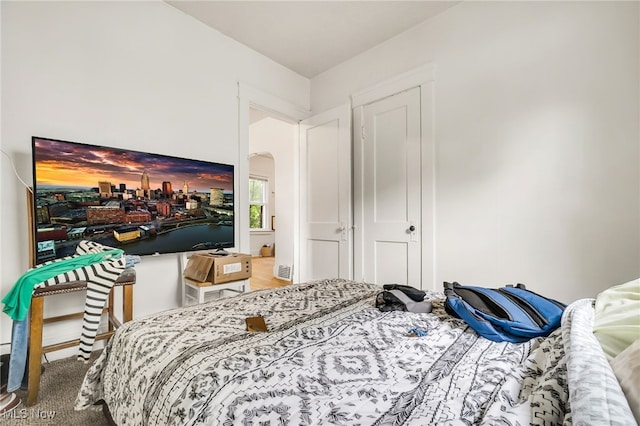 11020 Woodstock Ave, Cleveland, OH 44104 - carpeted bedroom featuring arched walkways