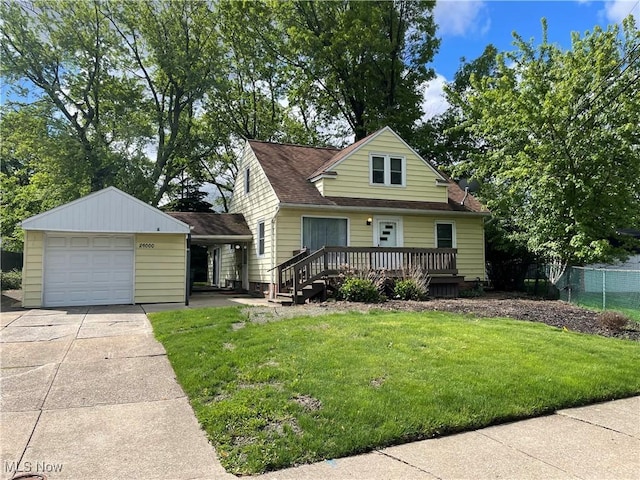 29000 Norman Ave, Wickliffe, OH 44092 - view of front of property featuring concrete driveway, a garage, a deck, and roof with shingles