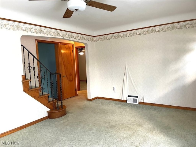 29000 Norman Ave, Wickliffe, OH 44092 - unfurnished room featuring a ceiling fan, arched walkways, carpet, and baseboards