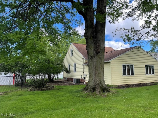 29000 Norman Ave, Wickliffe, OH 44092 - view of side of property with central AC and roof with shingles
