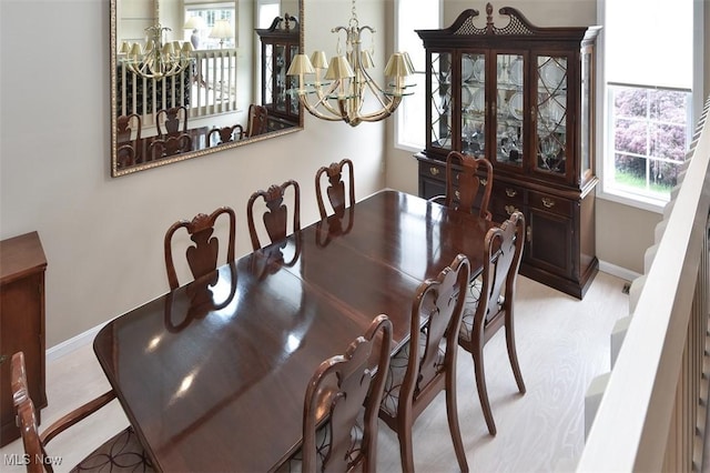 3691 Lexington Ct, Westlake, OH 44145 - dining space featuring a chandelier and baseboards