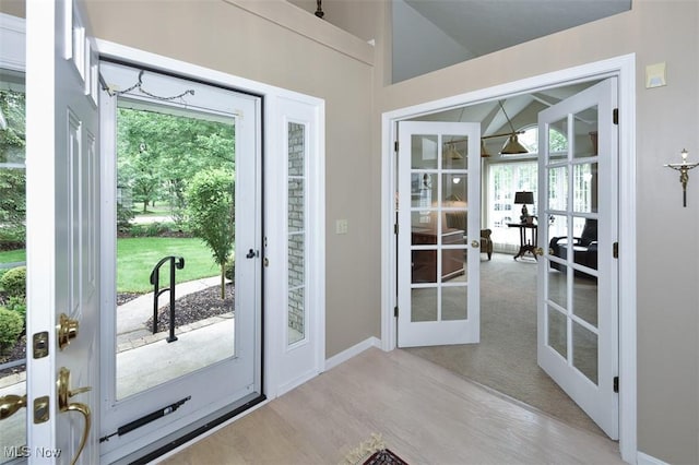 3691 Lexington Ct, Westlake, OH 44145 - entryway with french doors, wood finished floors, and baseboards