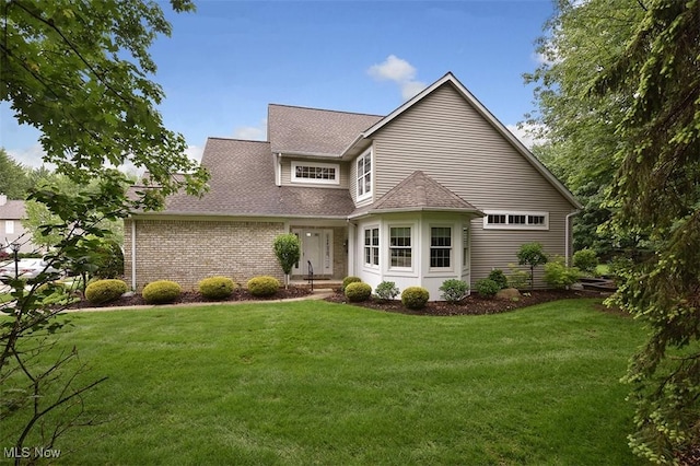 3691 Lexington Ct, Westlake, OH 44145 - view of front of house featuring a front yard and a shingled roof