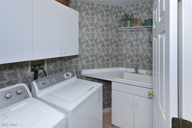 3691 Lexington Ct, Westlake, OH 44145 - laundry area with cabinet space, independent washer and dryer, and wallpapered walls