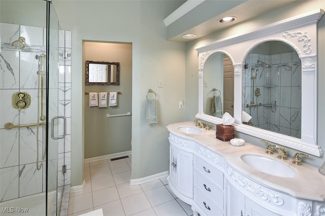 3691 Lexington Ct, Westlake, OH 44145 - bathroom with double vanity, a shower stall, tile patterned flooring, and baseboards