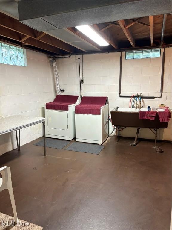 2499 Nesmith Lake Blvd, Akron, OH 44314 - basement with washing machine and dryer