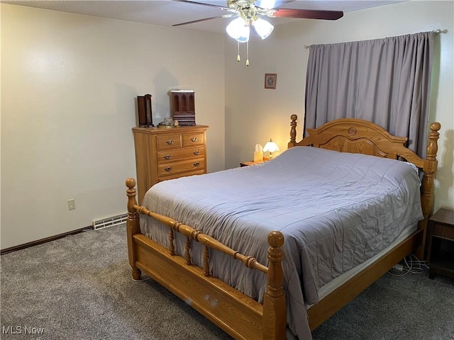 2733 W 37th St, Lorain, OH 44053 - carpeted bedroom with ceiling fan and baseboards