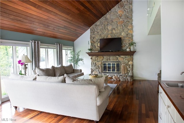 30907 Arlington Cir, Bay Village, OH 44140 - living room with a stone fireplace, wooden ceiling, hardwood / wood-style flooring, and high vaulted ceiling