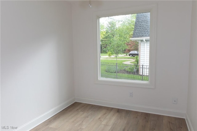 30907 Arlington Cir, Bay Village, OH 44140 - unfurnished room with light wood finished floors and baseboards