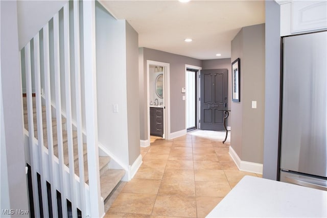 30907 Arlington Cir, Bay Village, OH 44140 - foyer entrance with baseboards, recessed lighting, stairway, and light tile patterned floors