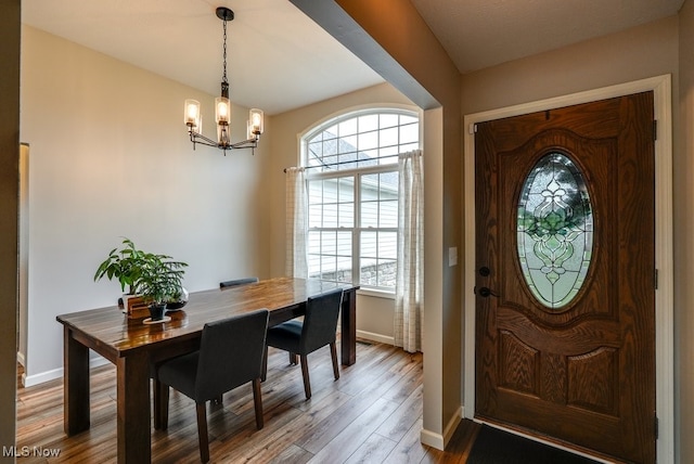 2042 Summer Evening Dr, Canal Fulton, OH 44614 - entryway with a chandelier, baseboards, and wood finished floors