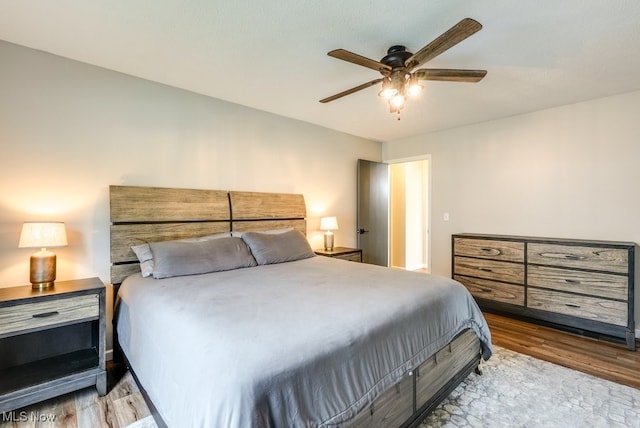 2042 Summer Evening Dr, Canal Fulton, OH 44614 - bedroom with wood finished floors and ceiling fan