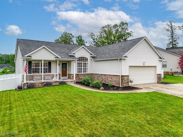 2042 Summer Evening Dr, Canal Fulton, OH 44614 - ranch-style home with a porch, driveway, an attached garage, and a shingled roof