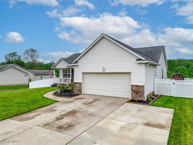 2042 Summer Evening Dr, Canal Fulton, OH 44614 - view of front of home featuring a garage, stone siding, and roof with shingles