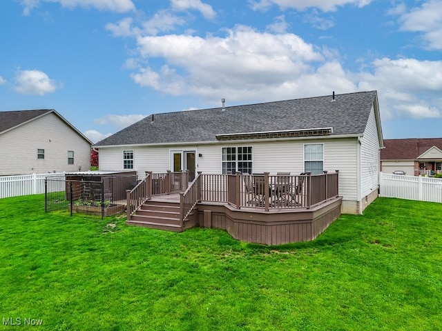 2042 Summer Evening Dr, Canal Fulton, OH 44614 - back of property with a shingled roof and a deck