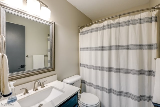 2042 Summer Evening Dr, Canal Fulton, OH 44614 - bathroom with toilet, vanity, and curtained shower