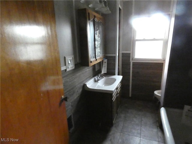 1020 Virginia St, Martins Ferry, OH 43935 - full bath featuring vanity, toilet, and tile patterned flooring