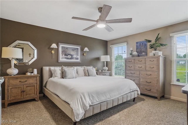8550 Ivy Hill Dr Unit 16, Poland, OH 44514 - bedroom featuring light colored carpet, multiple windows, and baseboards
