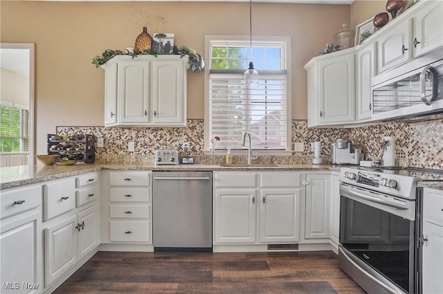 8550 Ivy Hill Dr Unit 16, Poland, OH 44514 - kitchen featuring stainless steel appliances, a sink, white cabinets, and dark wood-type flooring