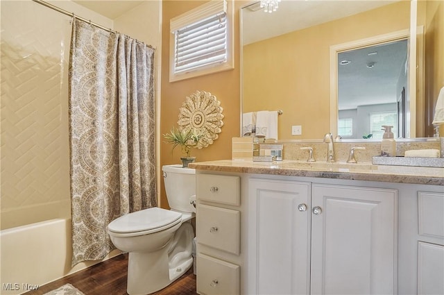 8550 Ivy Hill Dr Unit 16, Poland, OH 44514 - bathroom featuring toilet, vanity, shower / tub combo, and wood finished floors