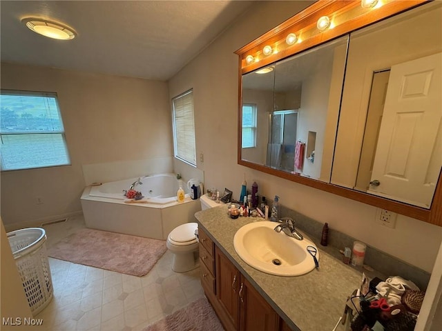 6920 Riverside Rd SE, Gnadenhutten, OH 44629 - bathroom with vanity, a bath, a stall shower, and toilet