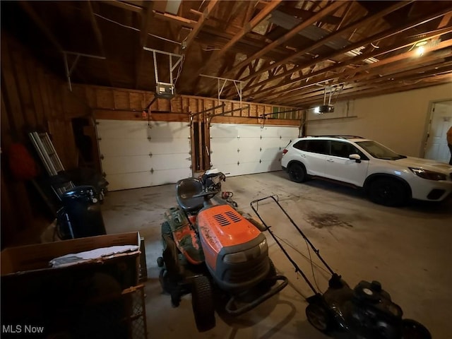 6920 Riverside Rd SE, Gnadenhutten, OH 44629 - garage featuring a garage door opener