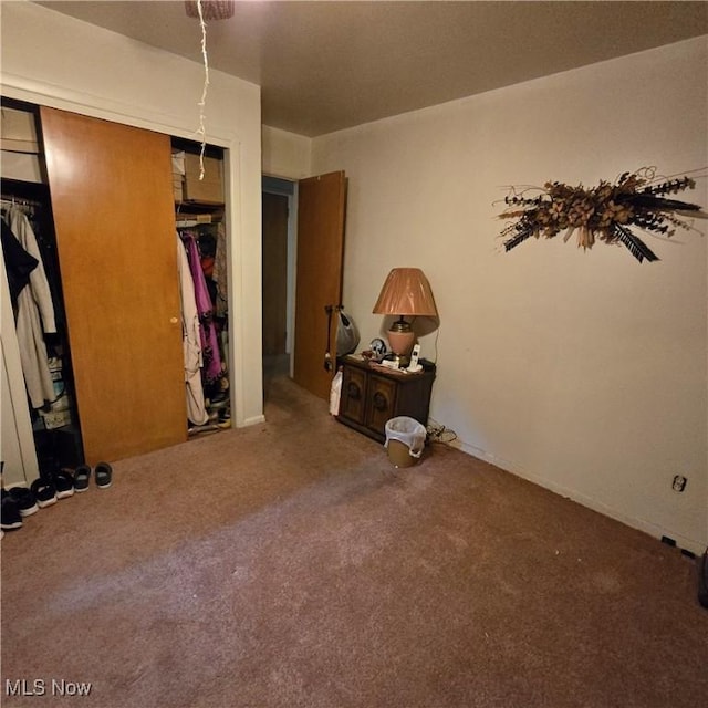 1669 Wood Rd, Cleveland Heights, OH 44121 - unfurnished bedroom featuring a closet and carpet floors