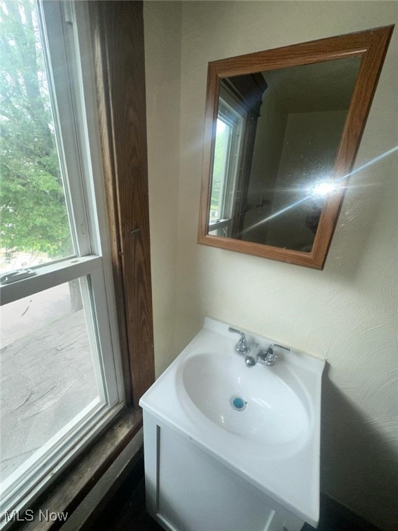 27 E Emerling Ave, Akron, OH 44301 - bathroom featuring plenty of natural light and vanity