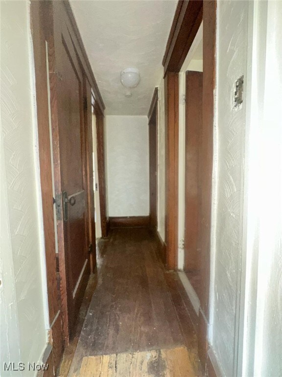 27 E Emerling Ave, Akron, OH 44301 - hallway featuring hardwood / wood-style flooring