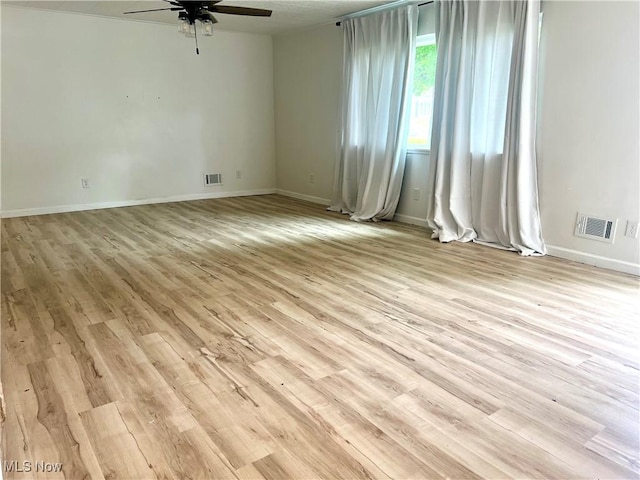 281 Hillcrest Dr, Wellsburg, WV 26070 - spare room featuring ceiling fan, light wood-style flooring, and baseboards