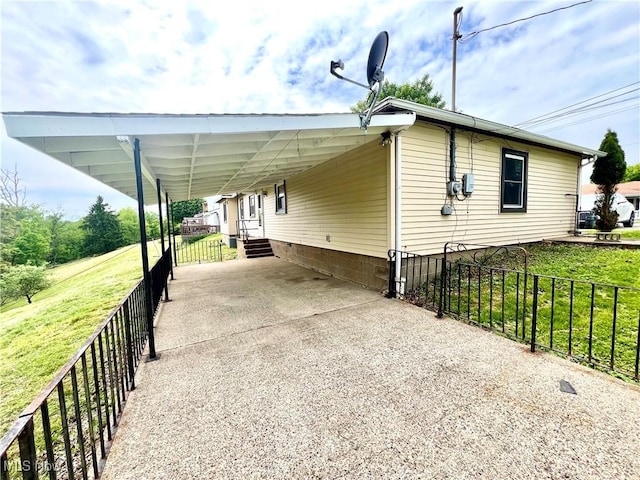 281 Hillcrest Dr, Wellsburg, WV 26070 - view of patio with driveway and an attached carport