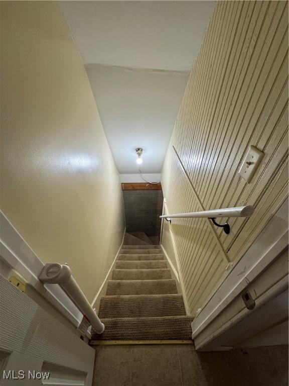 208 Walton Ave, Barnesville, OH 43713 - staircase featuring baseboards