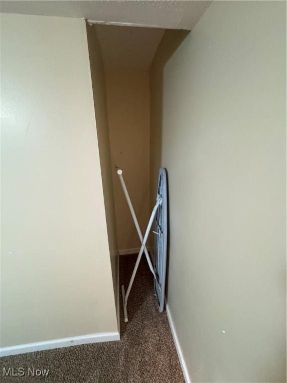 208 Walton Ave, Barnesville, OH 43713 - corridor with carpet floors, baseboards, and an upstairs landing