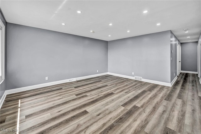 4482 W 144th St, Cleveland, OH 44135 - unfurnished room featuring wood finished floors, recessed lighting, and baseboards
