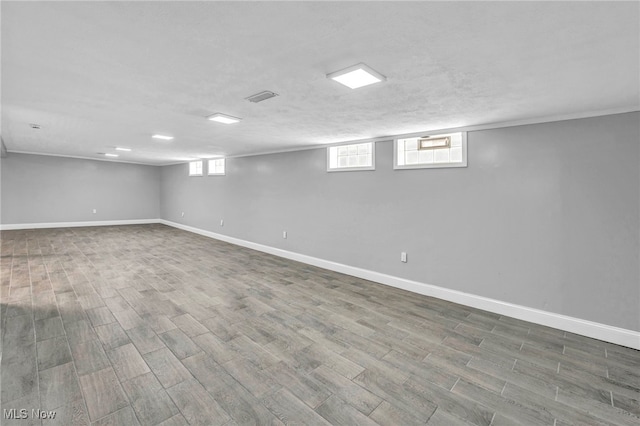 4482 W 144th St, Cleveland, OH 44135 - below grade area featuring wood finished floors and baseboards