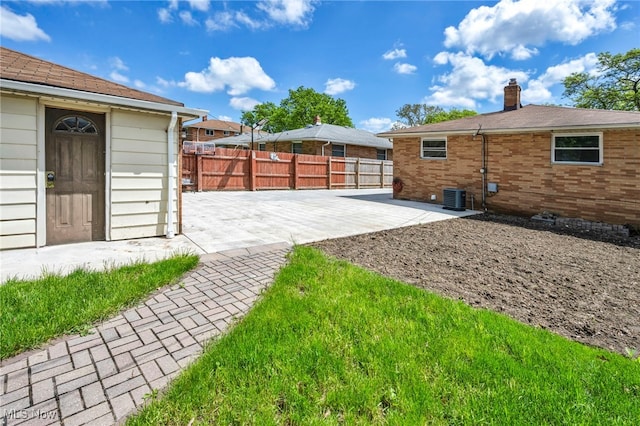 4482 W 144th St, Cleveland, OH 44135 - view of yard with a patio and cooling unit