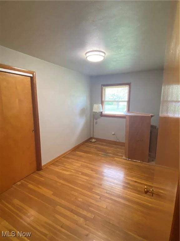 1414 W 40th St, Lorain, OH 44053 - empty room featuring wood finished floors