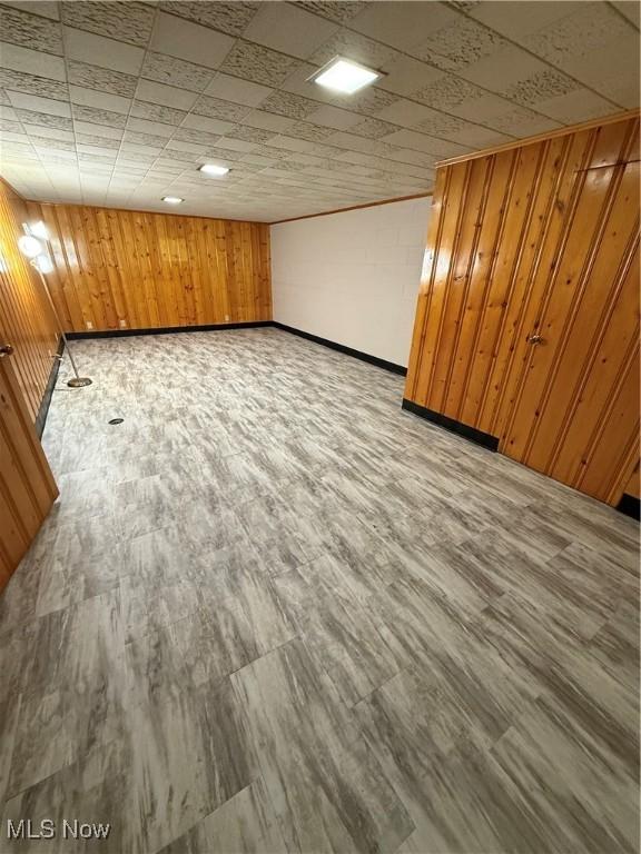 1414 W 40th St, Lorain, OH 44053 - finished below grade area featuring wood walls and baseboards