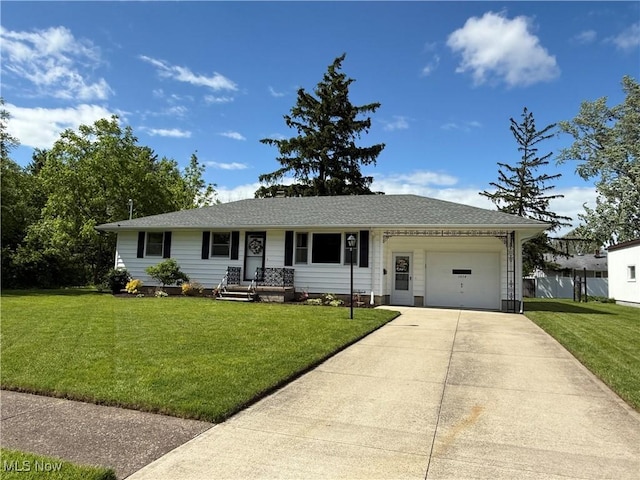 1414 W 40th St, Lorain, OH 44053 - ranch-style home with a garage and concrete driveway