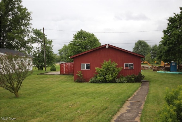 14201 Kauffman Ave, Sterling, OH 44276 - view of side of home featuring a yard