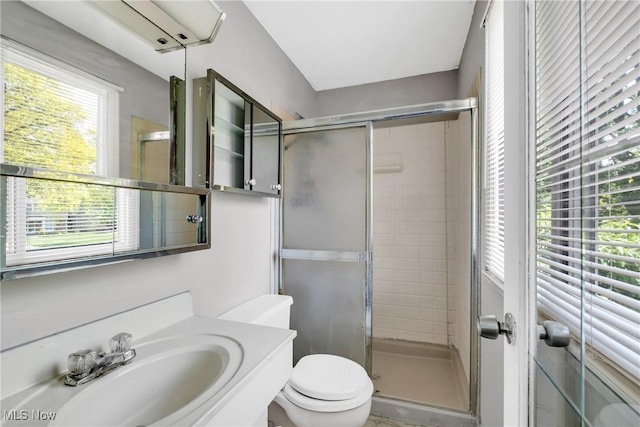6221 Brighton Dr, North Olmsted, OH 44070 - bathroom with toilet, a stall shower, and vanity