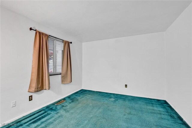 6221 Brighton Dr, North Olmsted, OH 44070 - carpeted spare room with baseboards